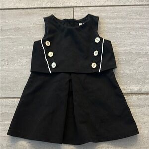 Black Sleeveless Dress with White Buttons